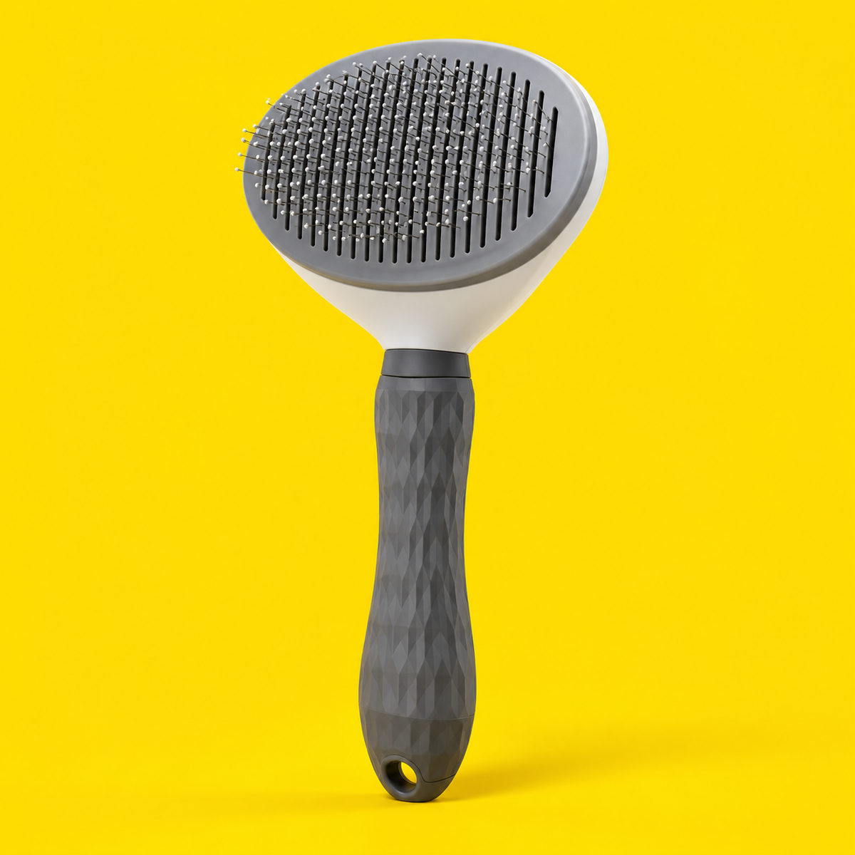 Brosse autonettoyante pour chien et chat